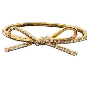 Kate Spade NY Skinny Mini Pave Bow
Gold Plated Hinged Bangle Feminine Bracelet